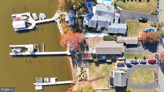 drone / aerial view with a water view