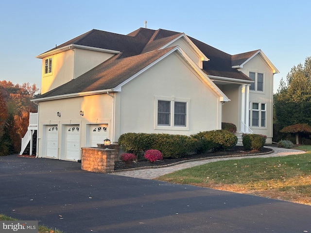 view of front of property featuring a garage