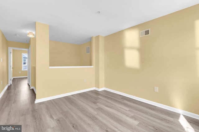 empty room featuring light hardwood / wood-style floors