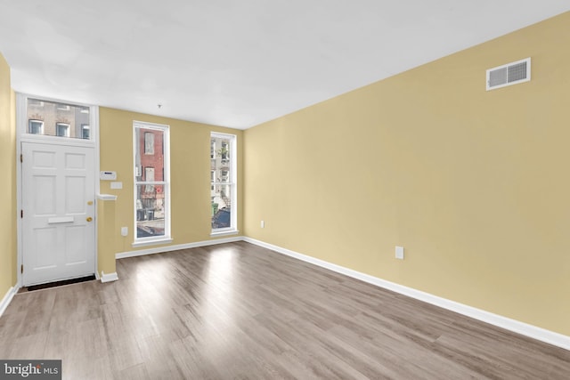 entrance foyer featuring light wood-type flooring