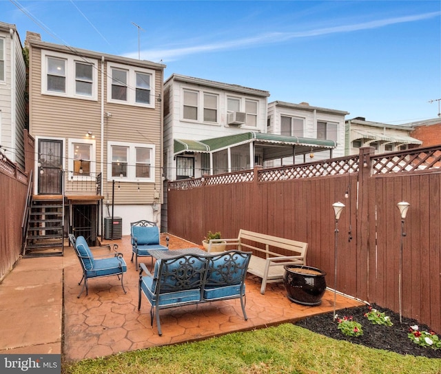 213 Channing St NE, Washington, DC 20002 - view of patio / terrace featuring an outdoor living space with a fire pit, cooling unit, and stairway