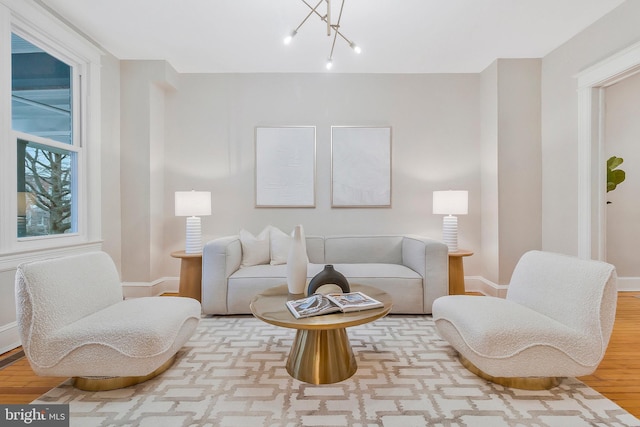213 Channing St NE, Washington, DC 20002 - living room with wood finished floors and a chandelier
