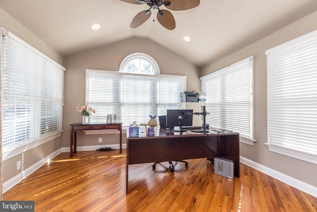 office with lofted ceiling, wood-type flooring, and ceiling fan