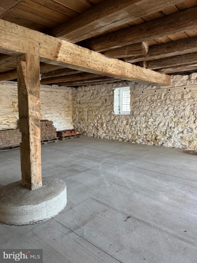 basement featuring wood ceiling