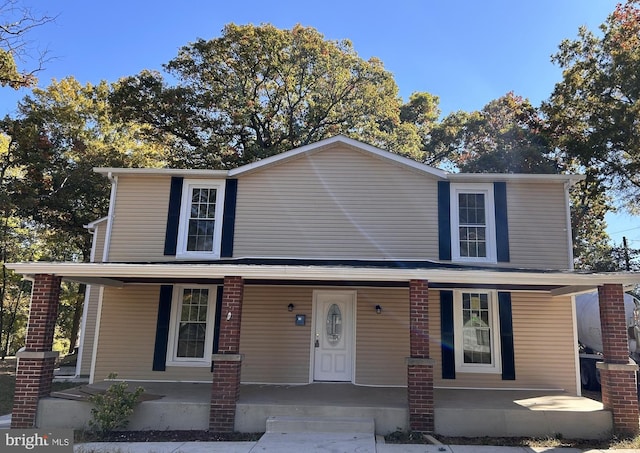 front of property featuring a porch