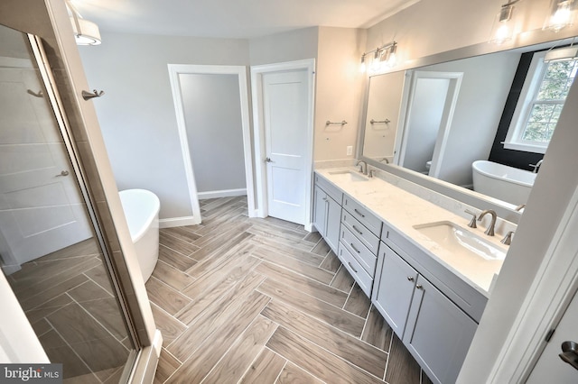 bathroom with vanity, plus walk in shower, and parquet floors