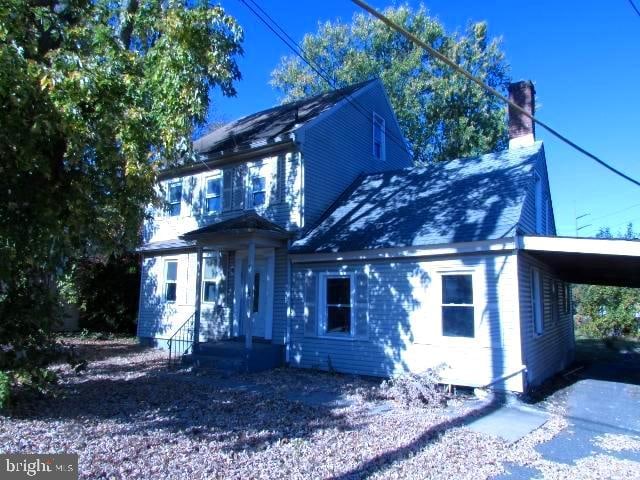 view of front of property with a carport