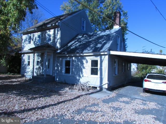 view of front of house with a carport