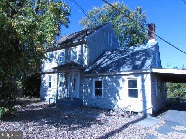 view of front of house featuring a carport