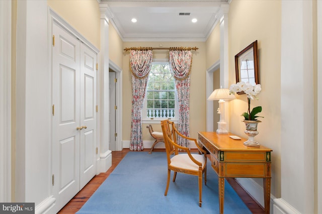 office featuring wood-type flooring and ornamental molding