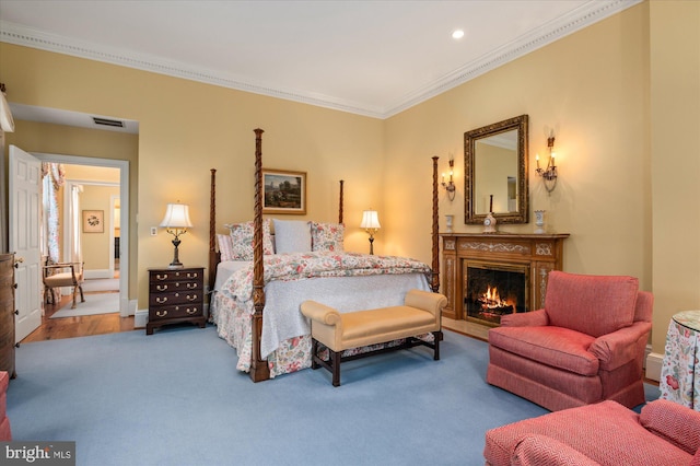 bedroom featuring carpet floors and ornamental molding