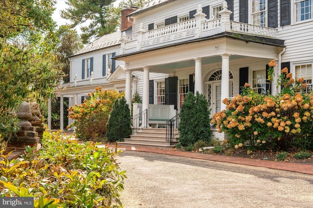 exterior space featuring a balcony