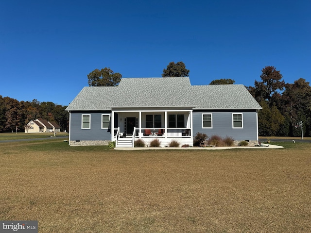 view of front of house with a front yard and a porch