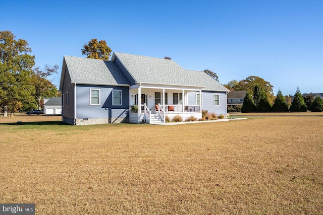 view of front of property with a porch and a front yard