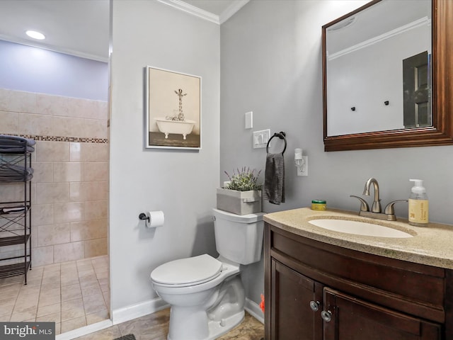 bathroom with tile patterned floors, vanity, ornamental molding, and toilet