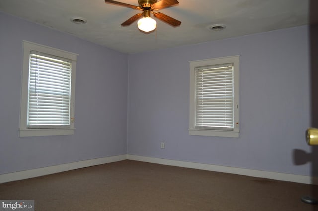 909 Ridge Rd, Westminster, MD 21157 - carpeted spare room with baseboards, visible vents, and a ceiling fan