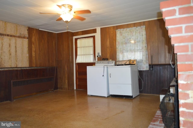 909 Ridge Rd, Westminster, MD 21157 - laundry room with wood walls, washer and dryer, ceiling fan, and laundry area