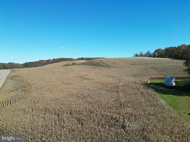 exterior space with a rural view