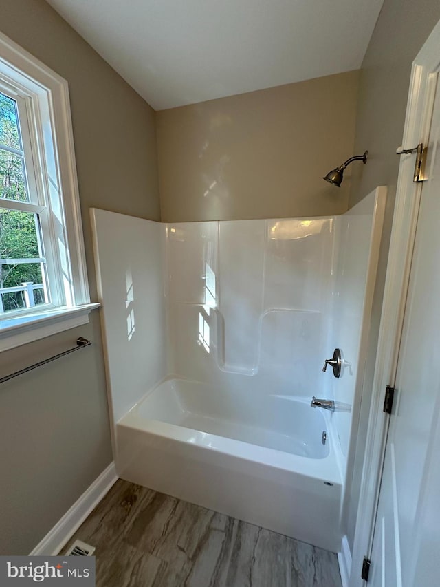 bathroom featuring tub / shower combination