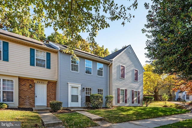 view of front of home with a front yard