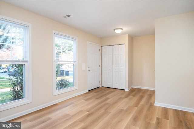 interior space with light hardwood / wood-style flooring