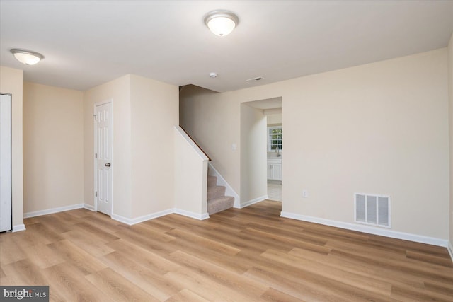 basement featuring light hardwood / wood-style flooring