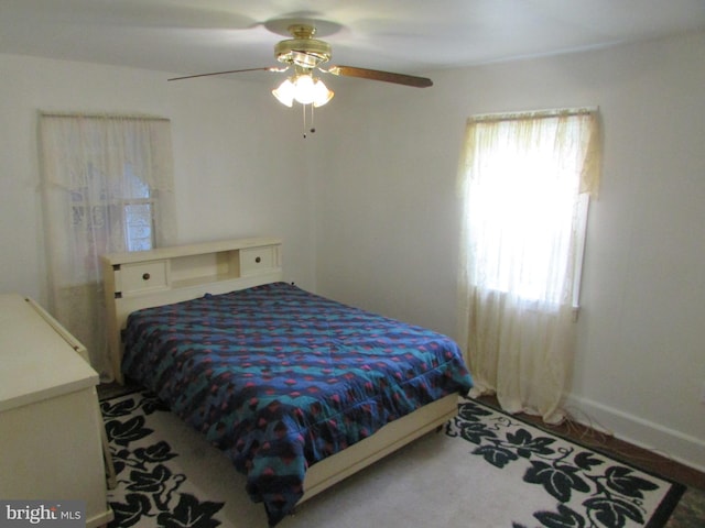 bedroom featuring ceiling fan