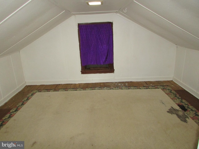 bonus room featuring lofted ceiling