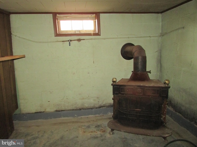 basement featuring a wood stove