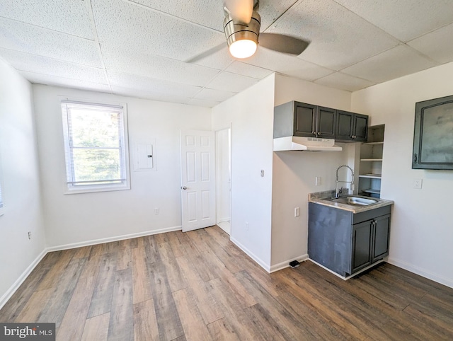 5200 Ballman, Brooklyn, MD 21225 - kitchen with dark wood-style floors, a paneled ceiling, a sink, ceiling fan, and electric panel