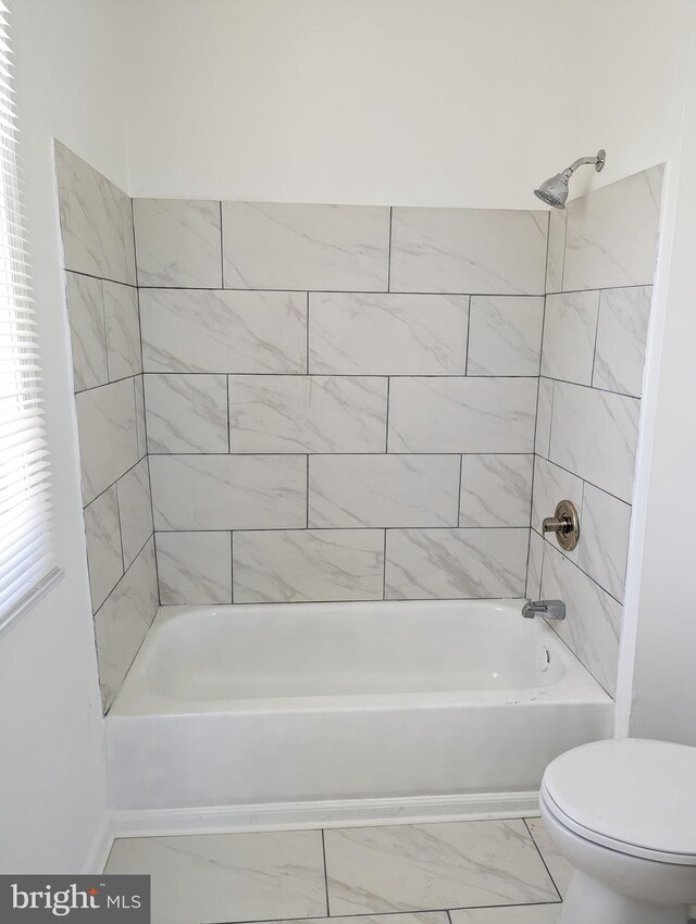 5200 Ballman, Brooklyn, MD 21225 - bathroom featuring toilet, shower / tub combination, and marble finish floor