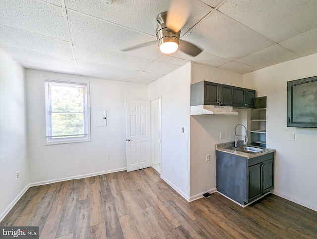 5200 Ballman, Brooklyn, MD 21225 - kitchen with a sink, ceiling fan, electric panel, a drop ceiling, and dark wood finished floors