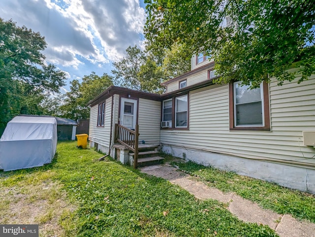 5200 Ballman, Brooklyn, MD 21225 - view of home's exterior with a lawn