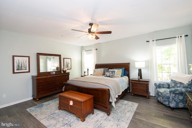 bedroom featuring dark wood-type flooring and ceiling fan