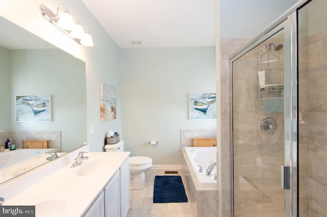 full bathroom with vanity, tile patterned flooring, shower with separate bathtub, and toilet