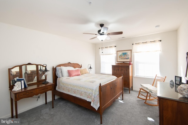 bedroom with ceiling fan and carpet floors