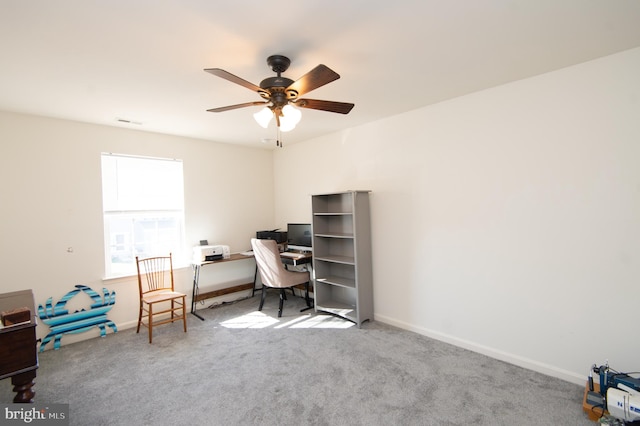 office with ceiling fan and carpet