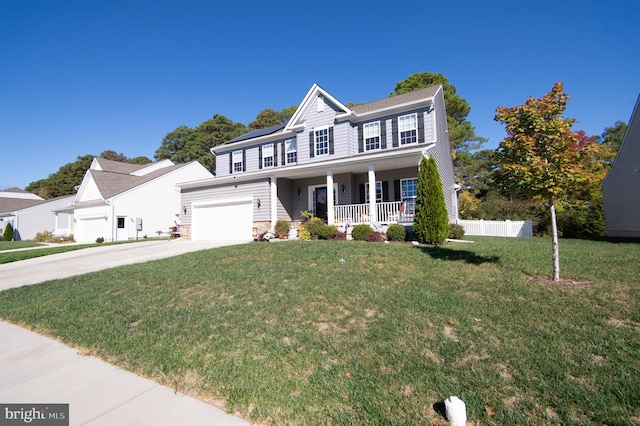 view of front of home featuring a front lawn and covered porch