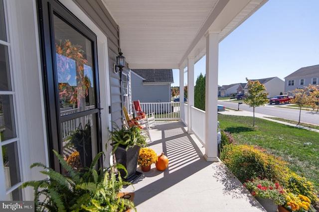 balcony featuring covered porch