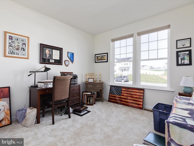 home office featuring light colored carpet