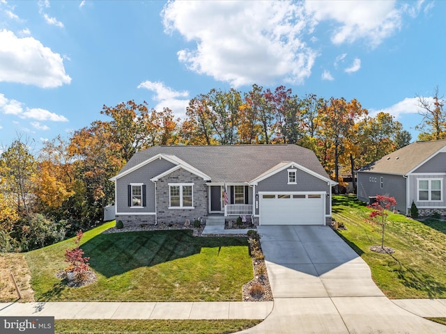 single story home with a front yard and a garage