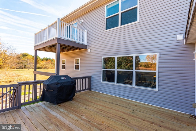 wooden terrace with grilling area