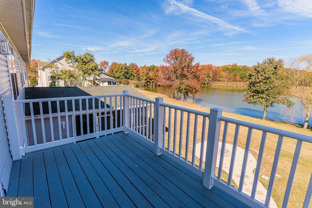 deck featuring a water view