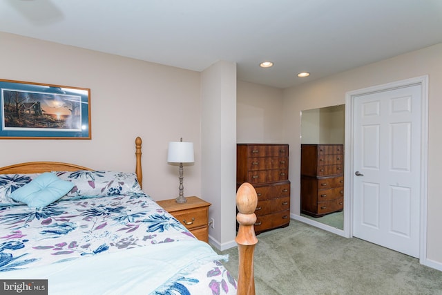 bedroom with light carpet