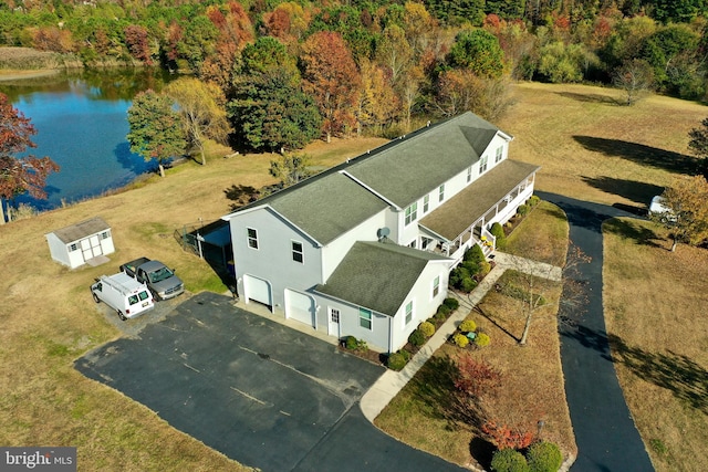 drone / aerial view with a water view