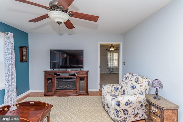 living room featuring ceiling fan