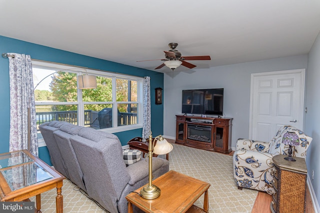 living room with ceiling fan