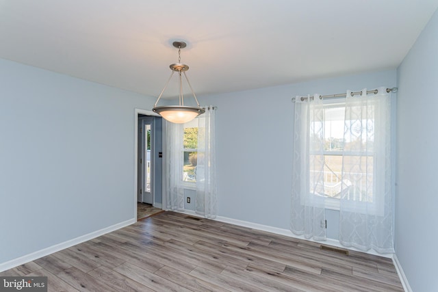 empty room with light wood-type flooring