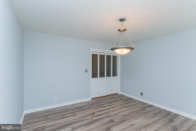 empty room featuring light hardwood / wood-style floors