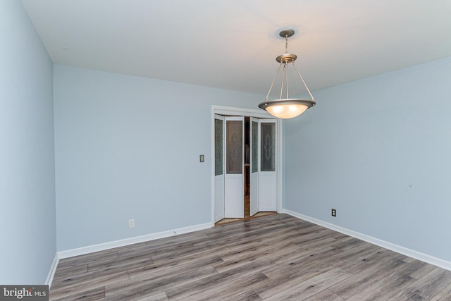 empty room featuring hardwood / wood-style floors